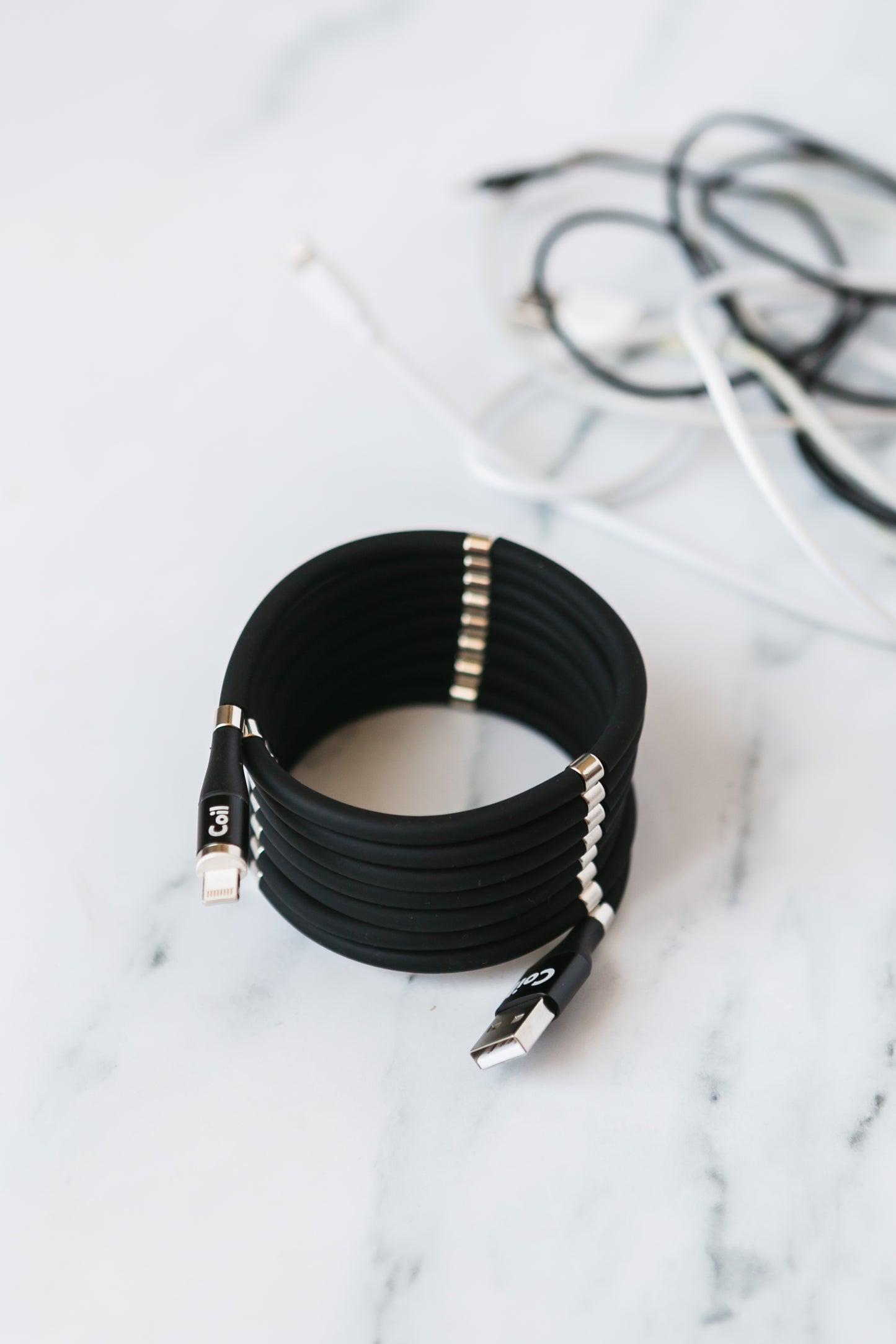 Coil β Self-Coiling Charger