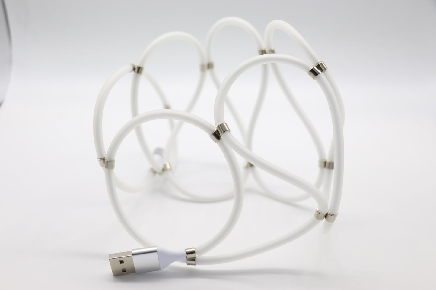 Coil β Self-Coiling Charger